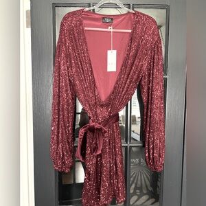 Beautiful , never worn, tag attached, deep red sequin wrap dress!